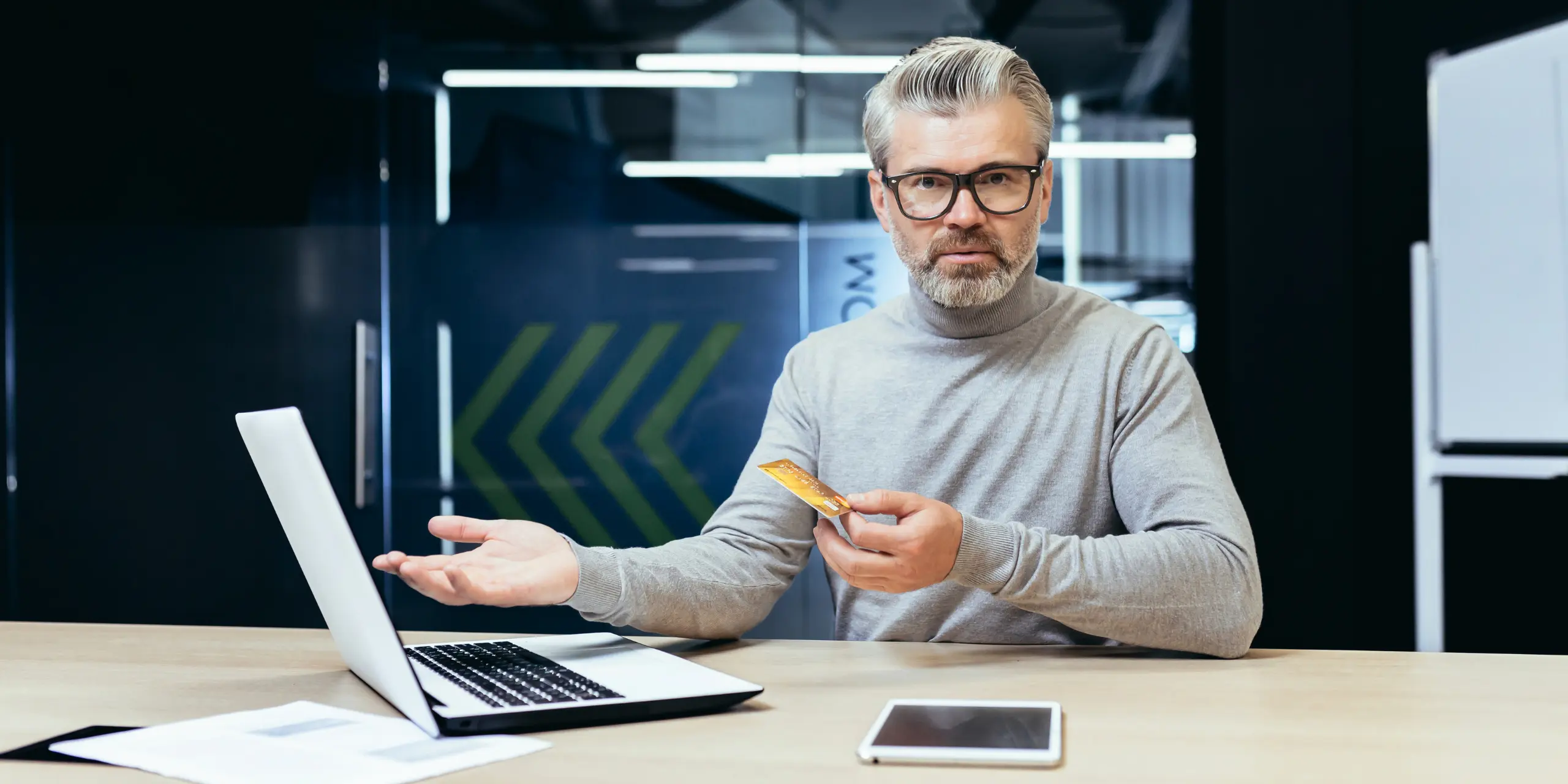 Business employee realizing they clicked a phishing link and contacting IT support