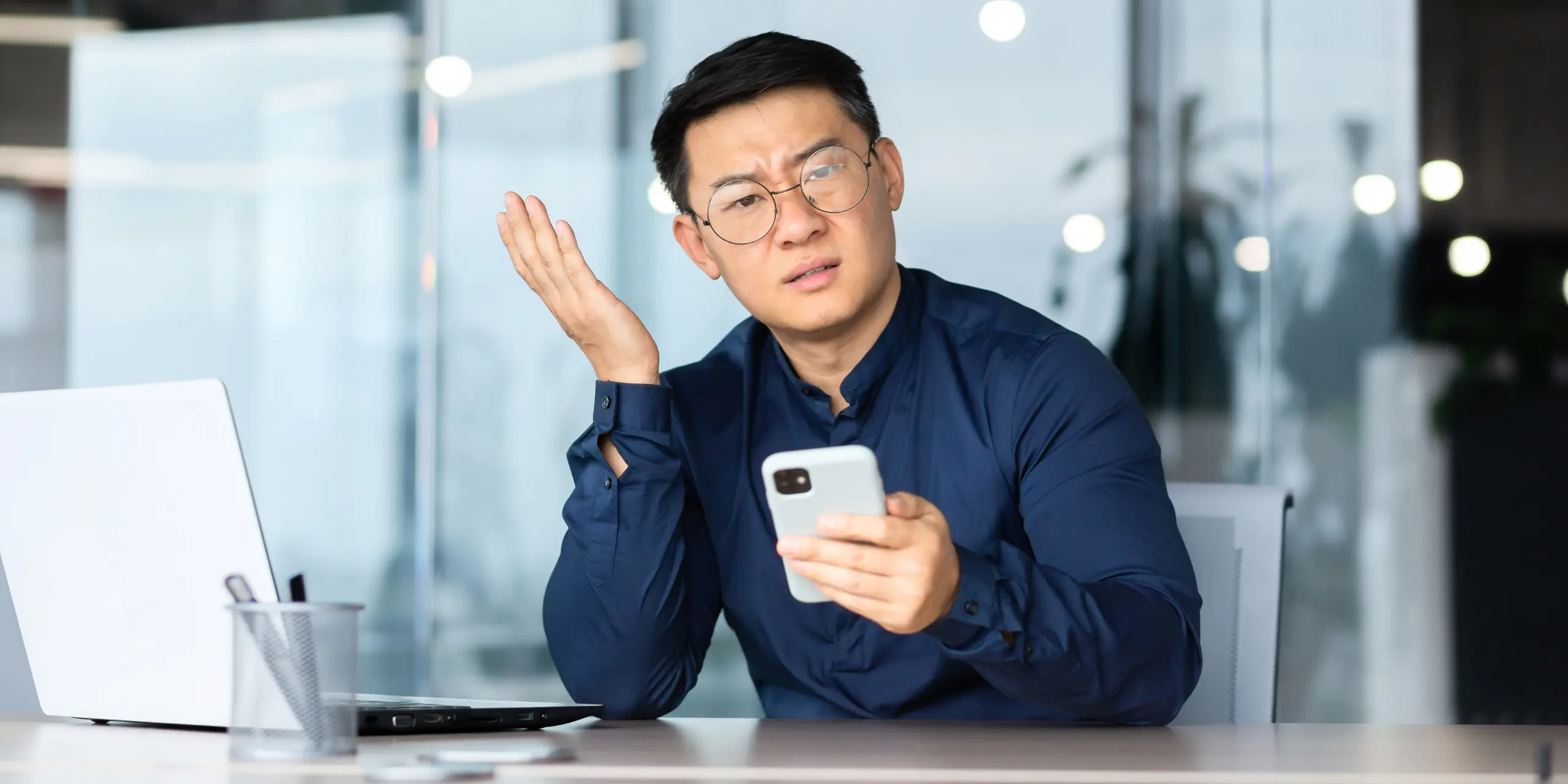 Business employee receiving a suspicious multi-factor authentication request